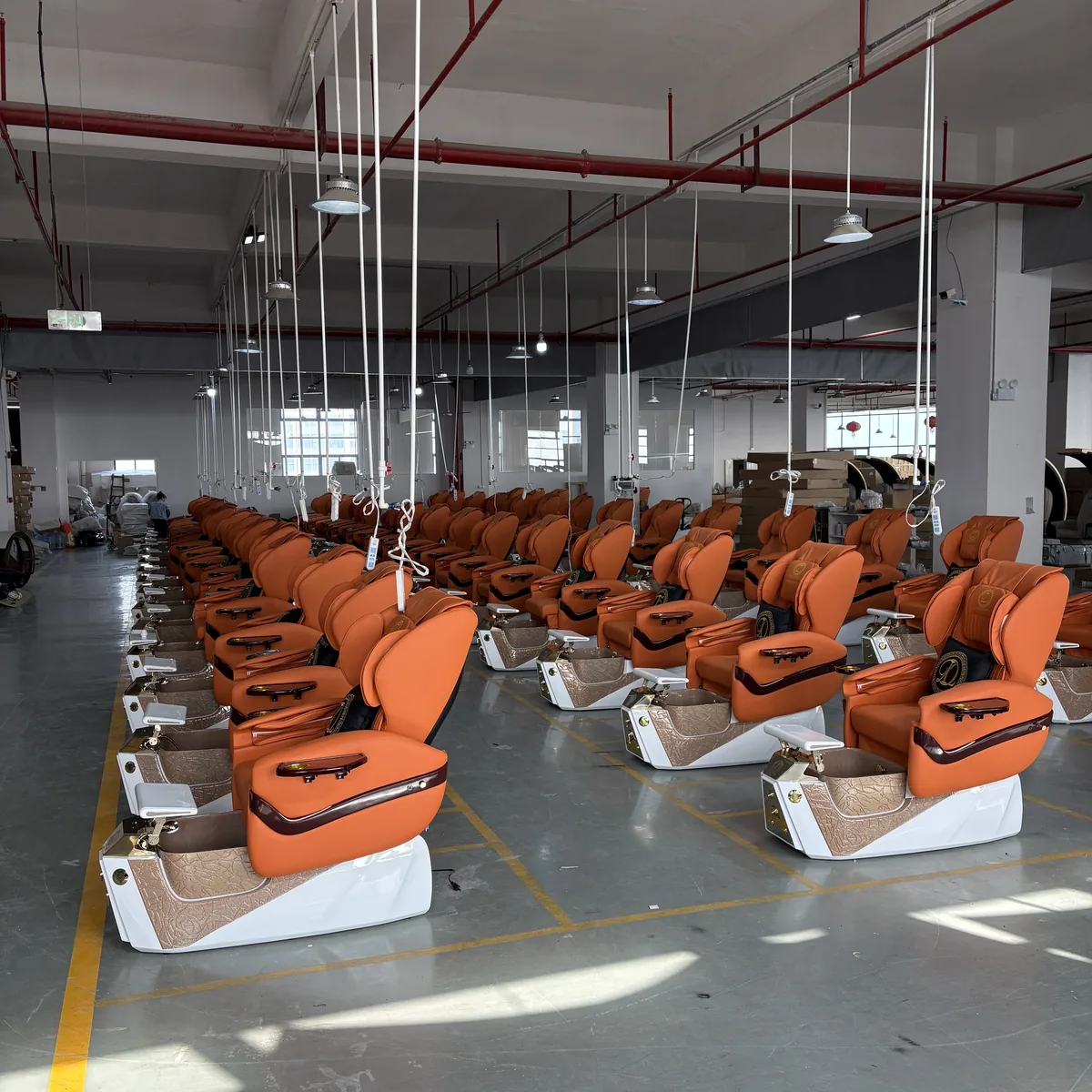 Finished pedicure chairs staged in the Corona4Salon workshop